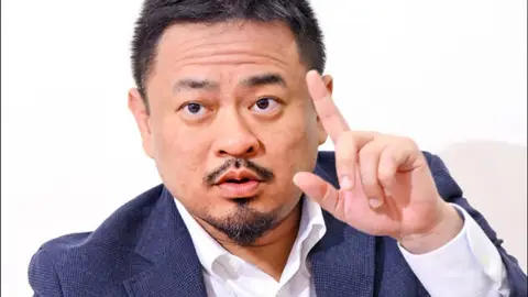 勞動部長洪申翰將赴南京開會，北京擬代辦台胞證引發關注